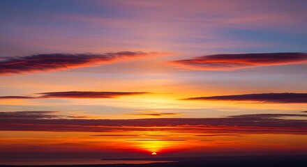 Fototapeta premium Vibrant sunset sky with dynamic cloud formations and warm color gradients