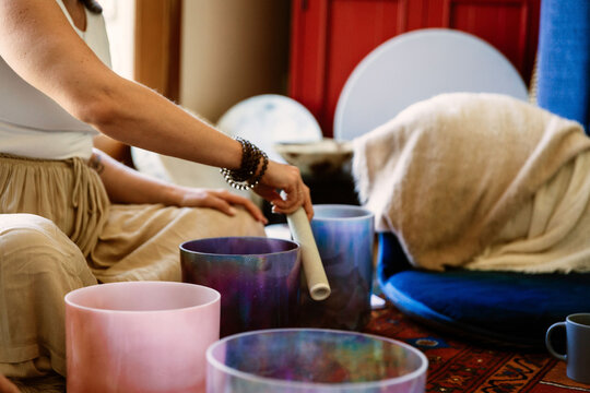 Woman with sound bowls