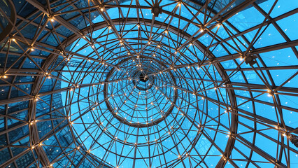 View of a glass dome structure with lights at night © Towfiqu Barbhuiya 