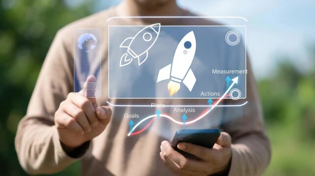 Man in beige shirt holding phone with transparent screen displaying business strategy and rocket  planning and analysis for goals actions and measurement