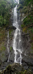 Obraz premium Portrait of a waterfall in a tropical forest