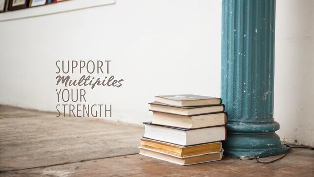 Inspirational Quote on Wall with Stack of Books Near Column in Cozy Educational Space