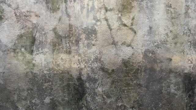 Texture concrete wall of light grey color cement texture background.Grey pastel rough crack cement texture stone concrete,rock plastered stucco wall; painted flat fade background. Side view, front. 