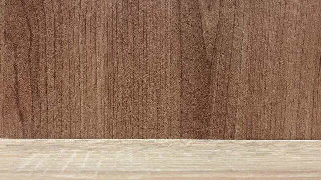 side view of empty wooden wall. Natural texture in harmonious wood. brown wood plank office table background texture. copy space, backgrounds. free, negative, text, design. industry, industrial. 