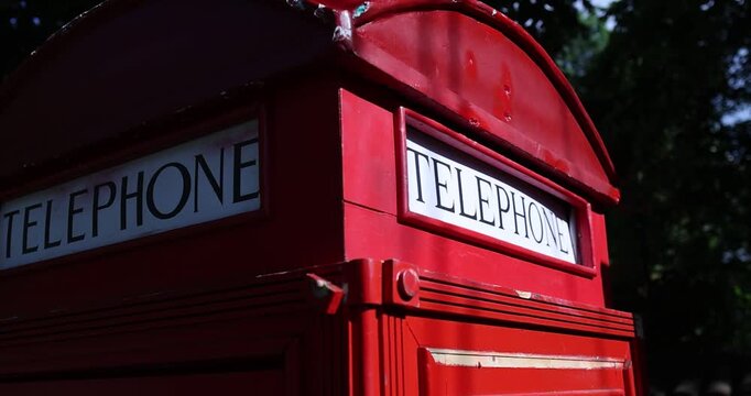 Replica of the famous classical UK red phone booths.