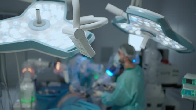 Surgical surgery health care team operating in operation room. Surgeons in hospital performs surgical procedures. Team of doctors processing surgical operation in modern emergency.