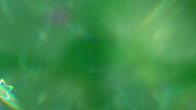 Abstract green energy radiates from a central point to form a dynamic pattern with ethereal light streaks and geometric shapes.