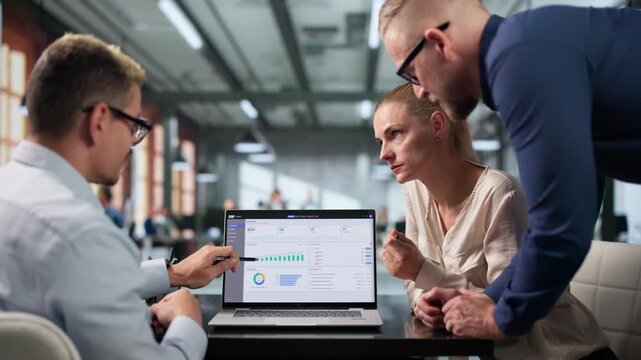 Enterprise Resource Planning Manager Leads Diverse Team Discussing Integrated