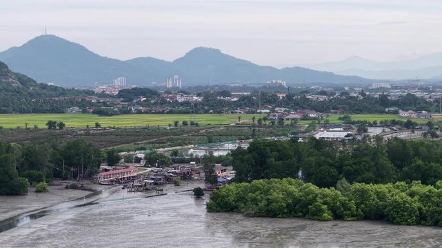Aerial drone view of Kampung Sungai Semilang Juru and surrounding mangrove and rice fields.