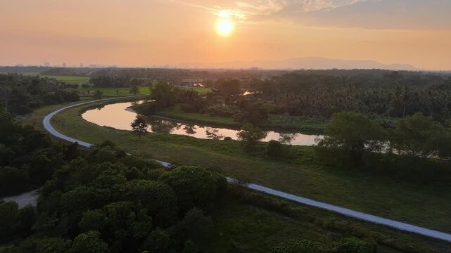 Aerial drone view of Labuh Banting river bend at sunset