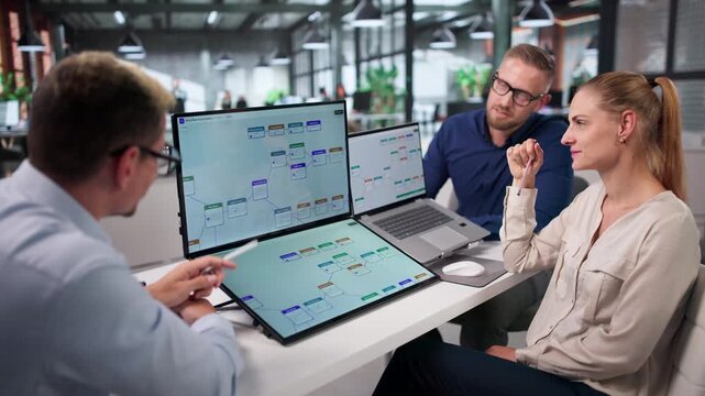 Project Manager Leads Diverse Team Optimizing Workflow