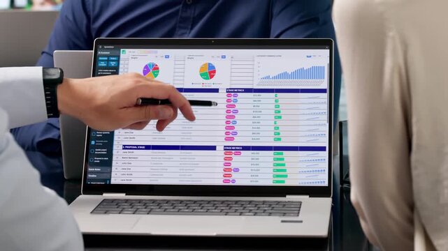 Medical Biller And Coder Analyzing Spreadsheet Data