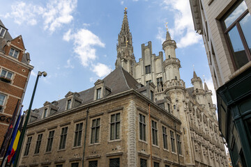 Fototapeta premium Low angle view of the historic Gothic architecture and spire of the Brussels Town Hall building