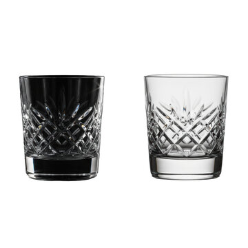 Two identical, high-end crystal whiskey tumblers with intricate diamond-cut faceting, one on Vanta Black, one on transparent, a maximal contrast studio shot for luxury barware advertising
