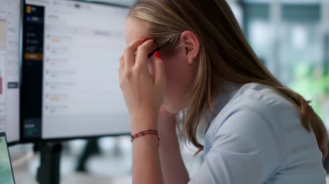 Tired Accountant Reviewing Financial Reports