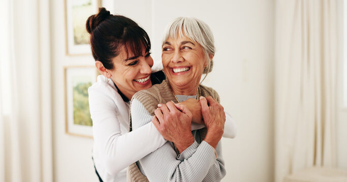 Hug, laughing and woman with senior parent in home for bonding, relationship or visit. Care, funny and smile of adult daughter embracing mother in apartment together for connection or retirement