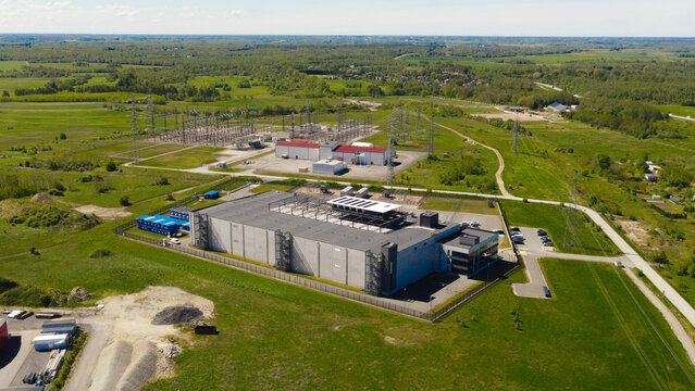 Large data center building in the countryside showcasing global connectivity. High speed networking. And computing infrastructure