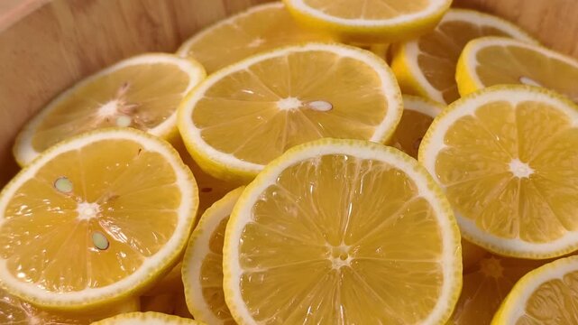 Close up display of fresh yellow lemon slices 