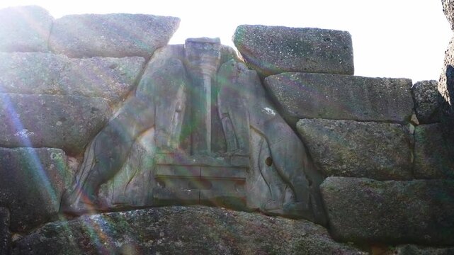 Ancient Lion Gate of Mycenae in Greece against a bright sun
