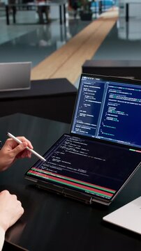 Software Developer Reviews Code Differences