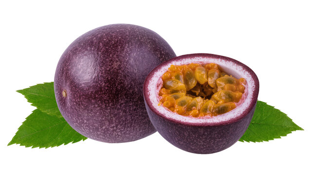 Whole and halved passion fruit with green leaves