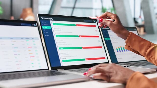 Procurement Manager Working On Laptop