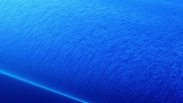 Abstract blue liquid motion background: flowing deep ocean waves and rippling water texture