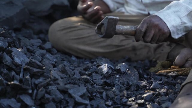 Indian senior man working at bricks factory