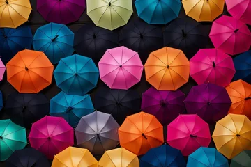 Umbrellas arranged in a dense, colorful pattern fostering concepts of diversity and protection © juliars
