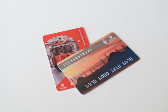 Two different generations of Istanbulkart contactless smart cards used for the public transport system placed on a white background. 