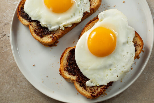 A top down view of some vegemite egg toast.