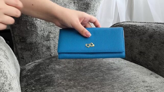 Woman checking wallet, personal budget, financial planning, money management and consumer spending concept.