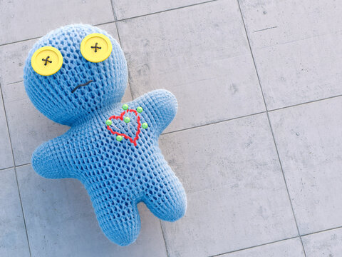 Pins sticking in voodoo doll, 3d rendering