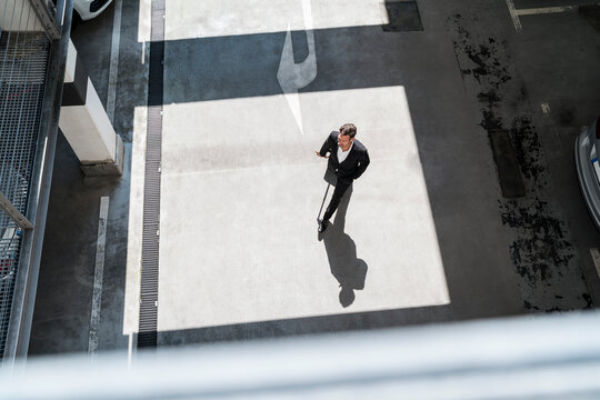 Top view of businessman with baggage on the go