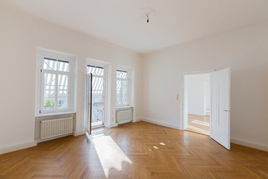 Spacious empty flat with herringbone parquet