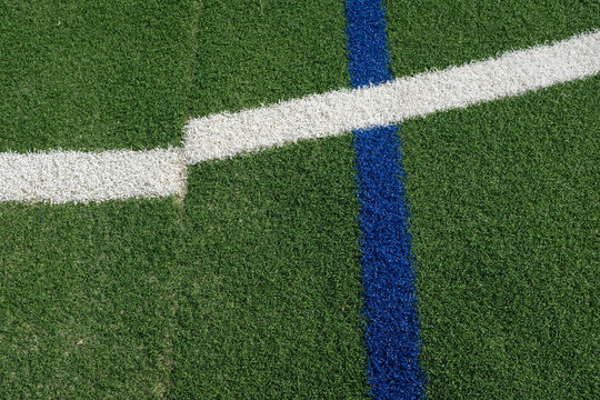 Defective misaligned white line on an artificial football pitch