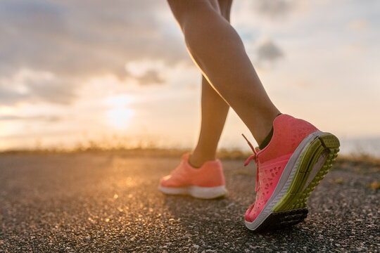 Legs of a running woman