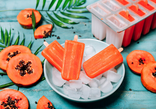 Homemade papaya ice lollies