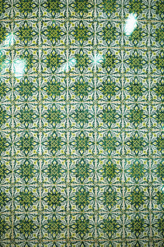 Green artisanal ceramic tile pattern from Portugal
