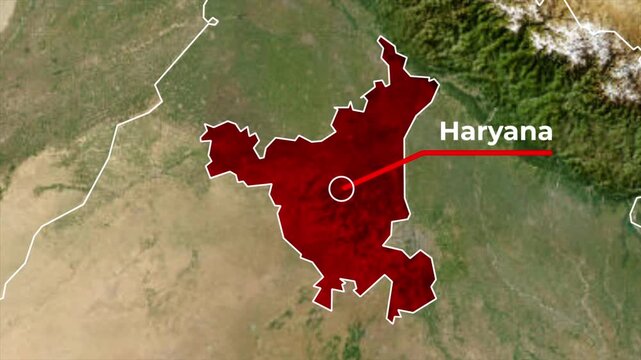 Zoomed in satellite terrain map animation of India highlighting Haryana state in red with a white outline, red callout pointer line, and blinking target location dot