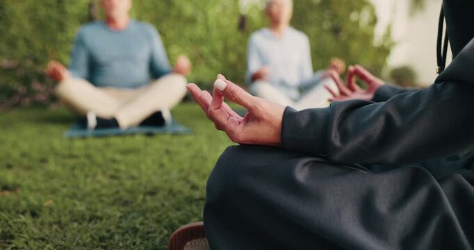 Meditation, person or hands with instructor in nature for spiritual wellness or outdoor mindfulness. Teacher, group or lotus pose with zen or lesson on grass field for chakra, mudra or inner peace
