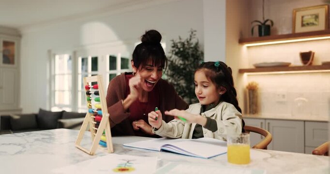 Mother, child and high five in house with homework, abacus or learning math for development goals. Happy woman, daughter and celebration in home with counting tool, success or milestone for education