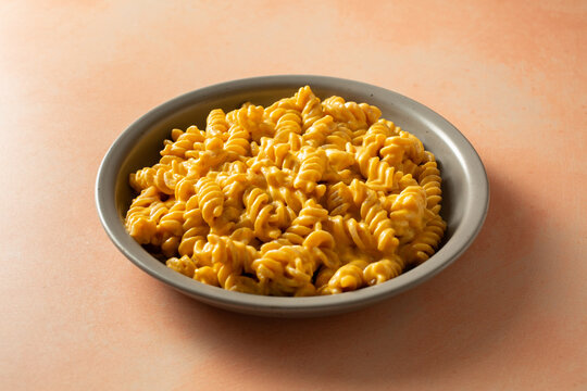 A view of a plate of dairy-free, gluten-free rotini mac n cheese.