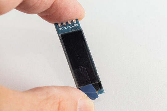I2C OLED Display Module 0.91 Inch in hand for DIY devices