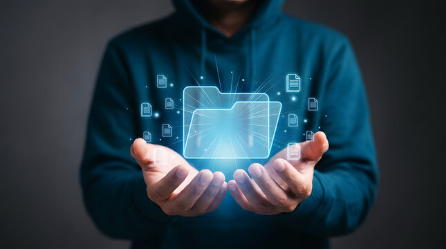 Person holding glowing digital folder with documents floating around data technology