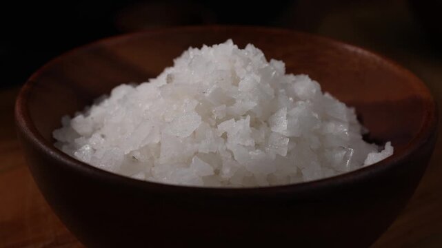 Dolly Shot of Natural Sea Salt in a Wooden Bowl