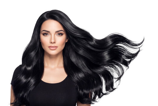 Beautiful model with flowing shiny waving long black hair studio portrait looking at camera isolated Cutout PNG