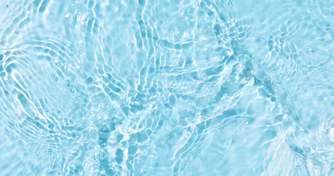 water waves cross each other creating ripples.