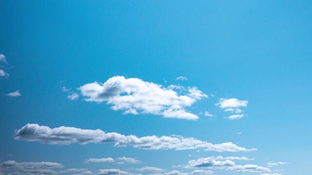 Clouds steady static display of clouds against a, in open sky with scattered clouds, with clouds, sky, from a aerial perspective looking down at the perspective, with blue, white accents.
