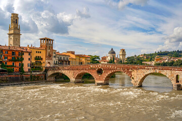 Fototapeta premium View on Arno Ponte Pietra and the banks of Arno River. Verona, Italy 